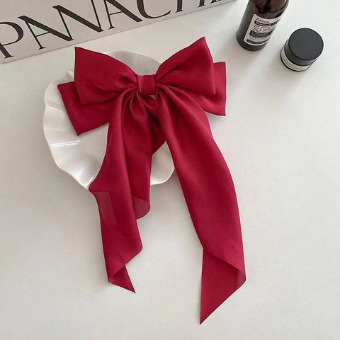 Elegant Fairy Bow Hairclip pack of 2 ( 1 black and 1 red )